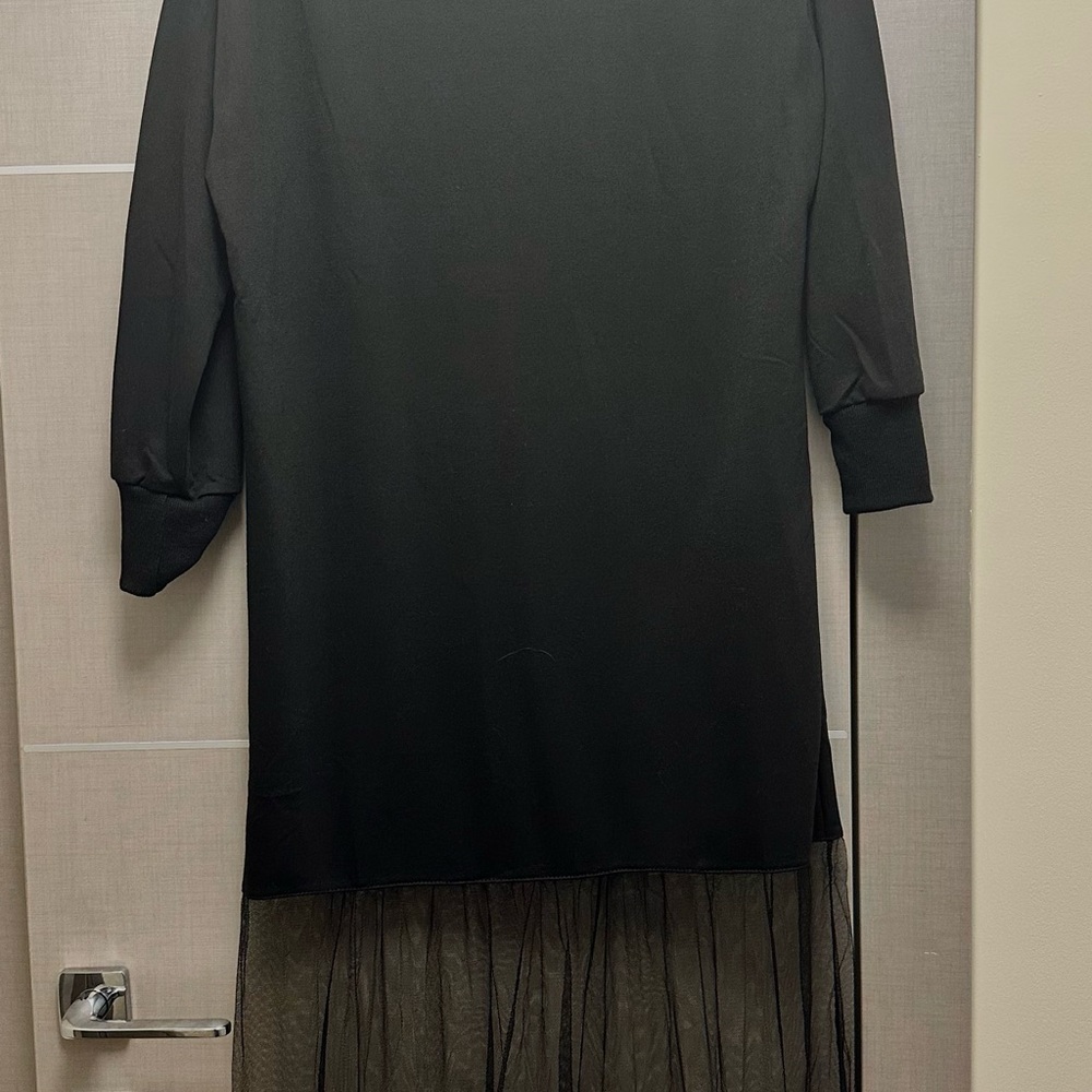 Elegant Black Dress with Sheer Hem